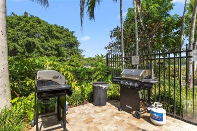Step into this lower penthouse condo where vintage charm meets on Palm-Aire Country Club and Resort - Palms in Florida - for sale on GolfHomes.com, golf home, golf lot