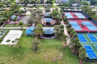 Step into this lower penthouse condo where vintage charm meets on Palm-Aire Country Club and Resort - Palms in Florida - for sale on GolfHomes.com, golf home, golf lot