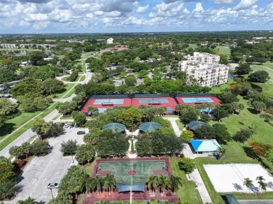 Step into this lower penthouse condo where vintage charm meets on Palm-Aire Country Club and Resort - Palms in Florida - for sale on GolfHomes.com, golf home, golf lot