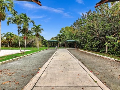 Step into this lower penthouse condo where vintage charm meets on Palm-Aire Country Club and Resort - Palms in Florida - for sale on GolfHomes.com, golf home, golf lot