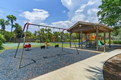 Welcome to this charming lakefront home in the private gated on Emerald Bay Golf Club in Florida - for sale on GolfHomes.com, golf home, golf lot