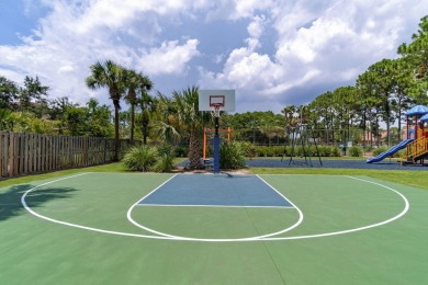 Welcome to this charming lakefront home in the private gated on Emerald Bay Golf Club in Florida - for sale on GolfHomes.com, golf home, golf lot