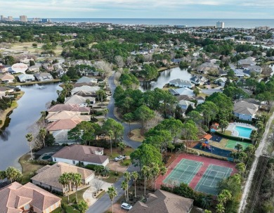 Welcome to this charming lakefront home in the private gated on Emerald Bay Golf Club in Florida - for sale on GolfHomes.com, golf home, golf lot