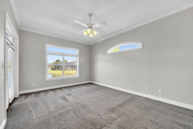 Welcome to this charming lakefront home in the private gated on Emerald Bay Golf Club in Florida - for sale on GolfHomes.com, golf home, golf lot