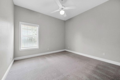 Welcome to this charming lakefront home in the private gated on Emerald Bay Golf Club in Florida - for sale on GolfHomes.com, golf home, golf lot
