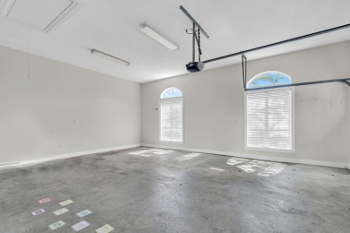 Welcome to this charming lakefront home in the private gated on Emerald Bay Golf Club in Florida - for sale on GolfHomes.com, golf home, golf lot