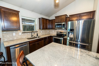 This beautiful single-level home sits on the Priest Lake Golf on Priest Lake Golf and Tennis Club in Idaho - for sale on GolfHomes.com, golf home, golf lot