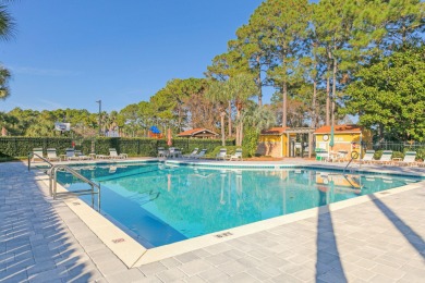 Welcome to this charming lakefront home in the private gated on Emerald Bay Golf Club in Florida - for sale on GolfHomes.com, golf home, golf lot