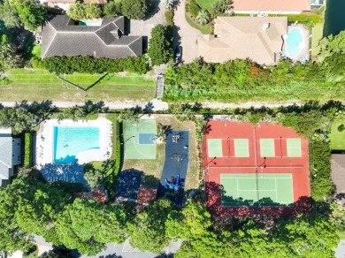 Welcome to this charming lakefront home in the private gated on Emerald Bay Golf Club in Florida - for sale on GolfHomes.com, golf home, golf lot