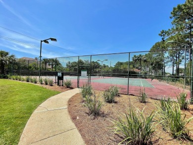Welcome to this charming lakefront home in the private gated on Emerald Bay Golf Club in Florida - for sale on GolfHomes.com, golf home, golf lot