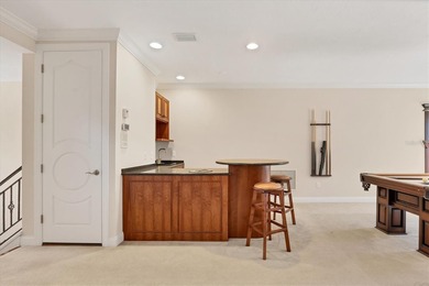 This luxury estate home in the exclusive Founders Club blends on The Founders Golf Club in Florida - for sale on GolfHomes.com, golf home, golf lot