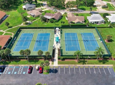 Under contract-accepting backup offers. This beautiful end-unit on Highland Lakes Executive Golf Course in Florida - for sale on GolfHomes.com, golf home, golf lot