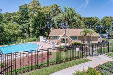 Under contract-accepting backup offers. This beautiful end-unit on Highland Lakes Executive Golf Course in Florida - for sale on GolfHomes.com, golf home, golf lot