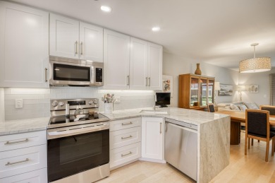GORGEOUS IN RIVERBEND! Welcome to this terrific townhome with on Riverbend Golf Club in Florida - for sale on GolfHomes.com, golf home, golf lot
