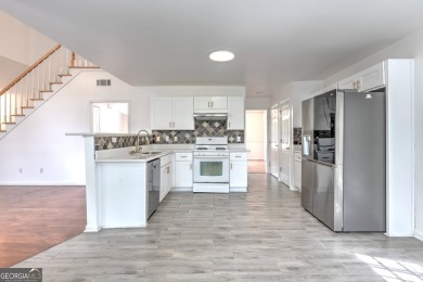 PRIME LOCATION! Beautiful traditional-style single-family home on TPC At Sugarloaf Golf Club in Georgia - for sale on GolfHomes.com, golf home, golf lot
