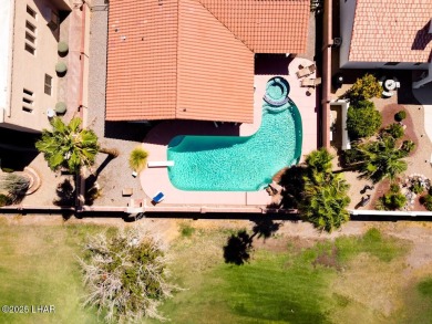 Discover an extraordinary opportunity to own a slice of paradise on London Bridge Golf Course in Arizona - for sale on GolfHomes.com, golf home, golf lot