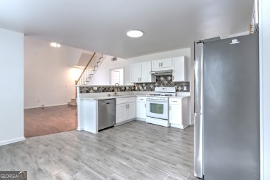 PRIME LOCATION! Beautiful traditional-style single-family home on TPC At Sugarloaf Golf Club in Georgia - for sale on GolfHomes.com, golf home, golf lot