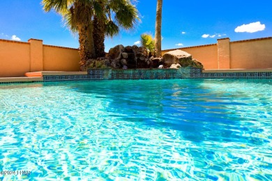 Discover an extraordinary opportunity to own a slice of paradise on London Bridge Golf Course in Arizona - for sale on GolfHomes.com, golf home, golf lot