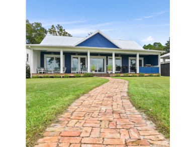 Indulge in the pinnacle of bayfront luxury with this exceptional on Windswept Dunes Golf Club in Florida - for sale on GolfHomes.com, golf home, golf lot