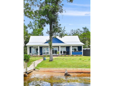 Indulge in the pinnacle of bayfront luxury with this exceptional on Windswept Dunes Golf Club in Florida - for sale on GolfHomes.com, golf home, golf lot