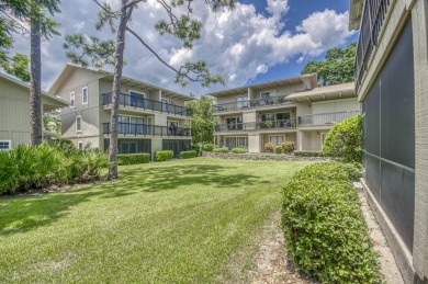 GORGEOUS IN RIVERBEND! Welcome to this terrific townhome with on Riverbend Golf Club in Florida - for sale on GolfHomes.com, golf home, golf lot