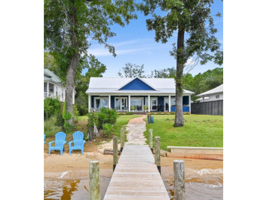 Indulge in the pinnacle of bayfront luxury with this exceptional on Windswept Dunes Golf Club in Florida - for sale on GolfHomes.com, golf home, golf lot