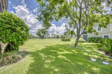 GORGEOUS IN RIVERBEND! Welcome to this terrific townhome with on Riverbend Golf Club in Florida - for sale on GolfHomes.com, golf home, golf lot