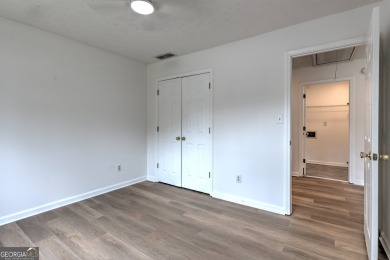PRIME LOCATION! Beautiful traditional-style single-family home on TPC At Sugarloaf Golf Club in Georgia - for sale on GolfHomes.com, golf home, golf lot
