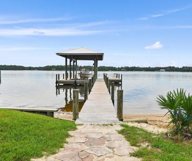 Indulge in the pinnacle of bayfront luxury with this exceptional on Windswept Dunes Golf Club in Florida - for sale on GolfHomes.com, golf home, golf lot