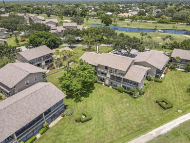GORGEOUS IN RIVERBEND! Welcome to this terrific townhome with on Riverbend Golf Club in Florida - for sale on GolfHomes.com, golf home, golf lot