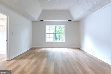 PRIME LOCATION! Beautiful traditional-style single-family home on TPC At Sugarloaf Golf Club in Georgia - for sale on GolfHomes.com, golf home, golf lot