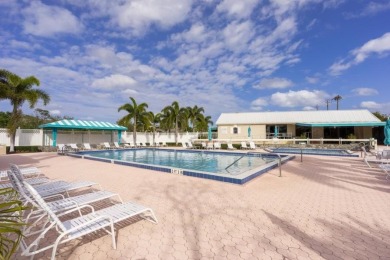 GORGEOUS IN RIVERBEND! Welcome to this terrific townhome with on Riverbend Golf Club in Florida - for sale on GolfHomes.com, golf home, golf lot