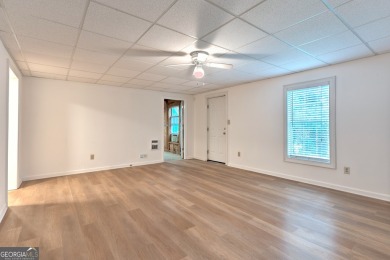 PRIME LOCATION! Beautiful traditional-style single-family home on TPC At Sugarloaf Golf Club in Georgia - for sale on GolfHomes.com, golf home, golf lot