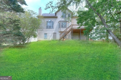 PRIME LOCATION! Beautiful traditional-style single-family home on TPC At Sugarloaf Golf Club in Georgia - for sale on GolfHomes.com, golf home, golf lot