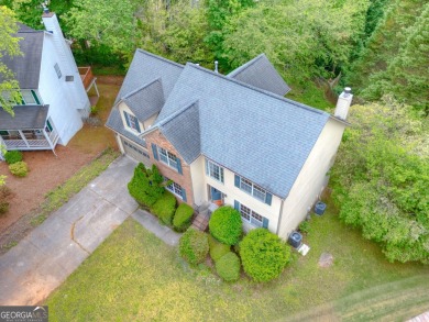 PRIME LOCATION! Beautiful traditional-style single-family home on TPC At Sugarloaf Golf Club in Georgia - for sale on GolfHomes.com, golf home, golf lot
