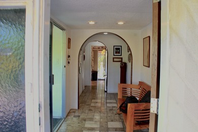 You've driven past this iconic home so many times! Finally, your on Waikoloa Village Golf Club in Hawaii - for sale on GolfHomes.com, golf home, golf lot