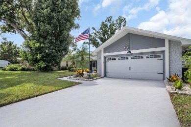 Welcome to this beautifully maintained 2-bedroom, 2-bathroom on Highland Lakes Executive Golf Course in Florida - for sale on GolfHomes.com, golf home, golf lot