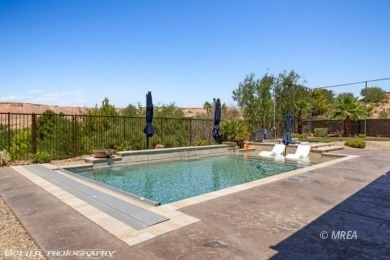 Custom-built home in the gated community of The Reserve on Falcon Ridge Golf Course in Nevada - for sale on GolfHomes.com, golf home, golf lot