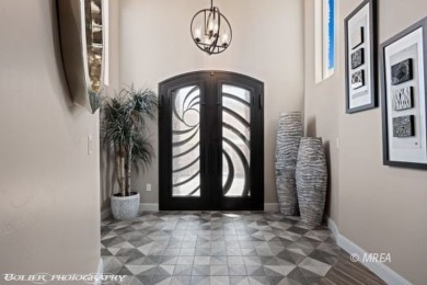 Custom-built home in the gated community of The Reserve on Falcon Ridge Golf Course in Nevada - for sale on GolfHomes.com, golf home, golf lot