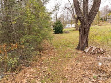 Explore this lovely residential building lot in downtown Black on Black Mountain Golf Course in North Carolina - for sale on GolfHomes.com, golf home, golf lot