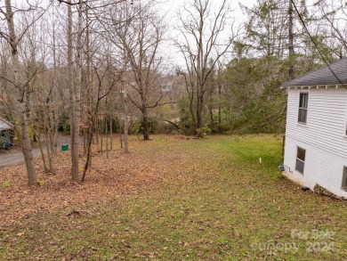 Explore this lovely residential building lot in downtown Black on Black Mountain Golf Course in North Carolina - for sale on GolfHomes.com, golf home, golf lot