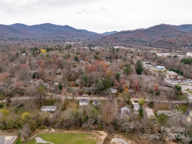 Explore this lovely residential building lot in downtown Black on Black Mountain Golf Course in North Carolina - for sale on GolfHomes.com, golf home, golf lot