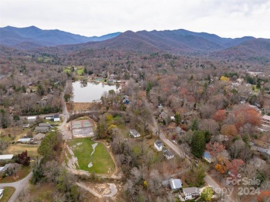 Explore this lovely residential building lot in downtown Black on Black Mountain Golf Course in North Carolina - for sale on GolfHomes.com, golf home, golf lot