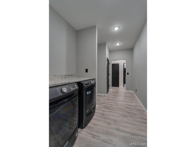 Experience refined modern living in this stunning 2025 on Indian Lake Golf and Country Club in Michigan - for sale on GolfHomes.com, golf home, golf lot