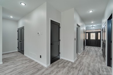 Experience refined modern living in this stunning 2025 on Indian Lake Golf and Country Club in Michigan - for sale on GolfHomes.com, golf home, golf lot