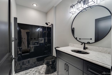 Experience refined modern living in this stunning 2025 on Indian Lake Golf and Country Club in Michigan - for sale on GolfHomes.com, golf home, golf lot