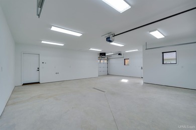 Experience refined modern living in this stunning 2025 on Indian Lake Golf and Country Club in Michigan - for sale on GolfHomes.com, golf home, golf lot