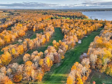 Experience refined modern living in this stunning 2025 on Indian Lake Golf and Country Club in Michigan - for sale on GolfHomes.com, golf home, golf lot