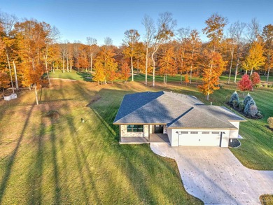 Experience refined modern living in this stunning 2025 on Indian Lake Golf and Country Club in Michigan - for sale on GolfHomes.com, golf home, golf lot