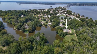 WATERFRONT PROPERTY. This exceptional colonial-style residence on Fort Lee Cardinal Golf Course in Virginia - for sale on GolfHomes.com, golf home, golf lot